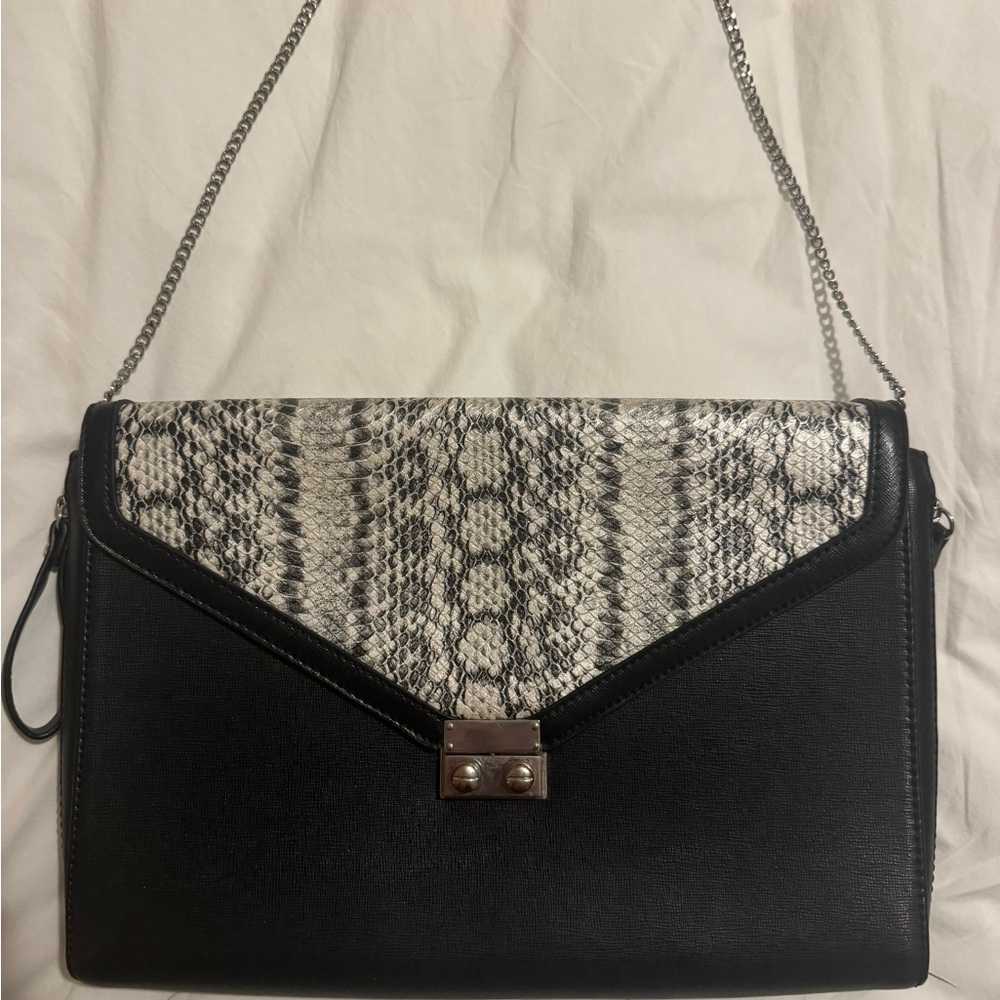 BCBGeneration Black and Snakeskin Shoulder Bag